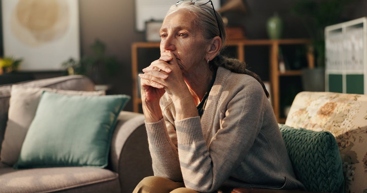 Senior woman thinking, solo aging reflection