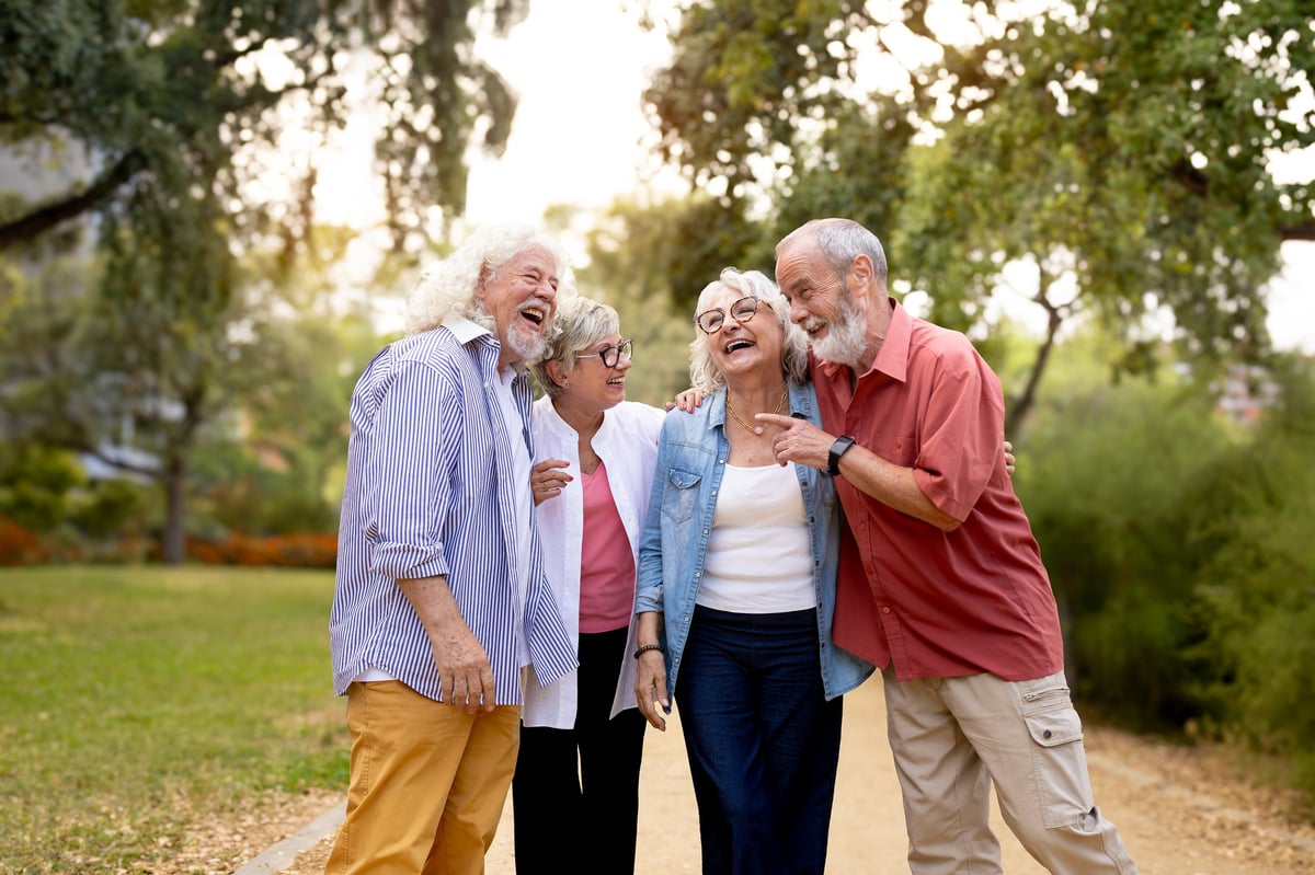 Group of senior friends connecting outdoors